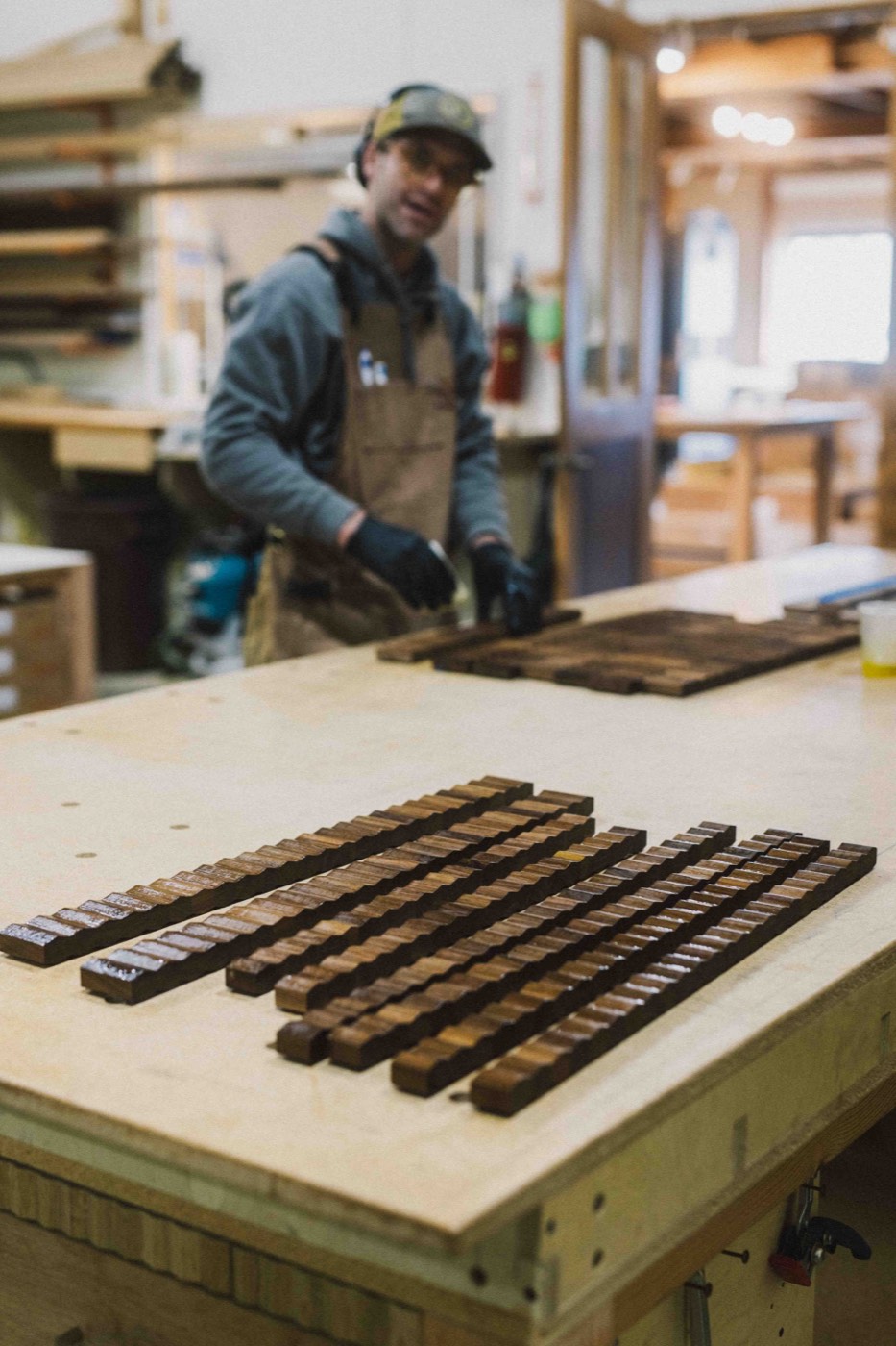 Craftsmen at work in the Instinct Builders workshop