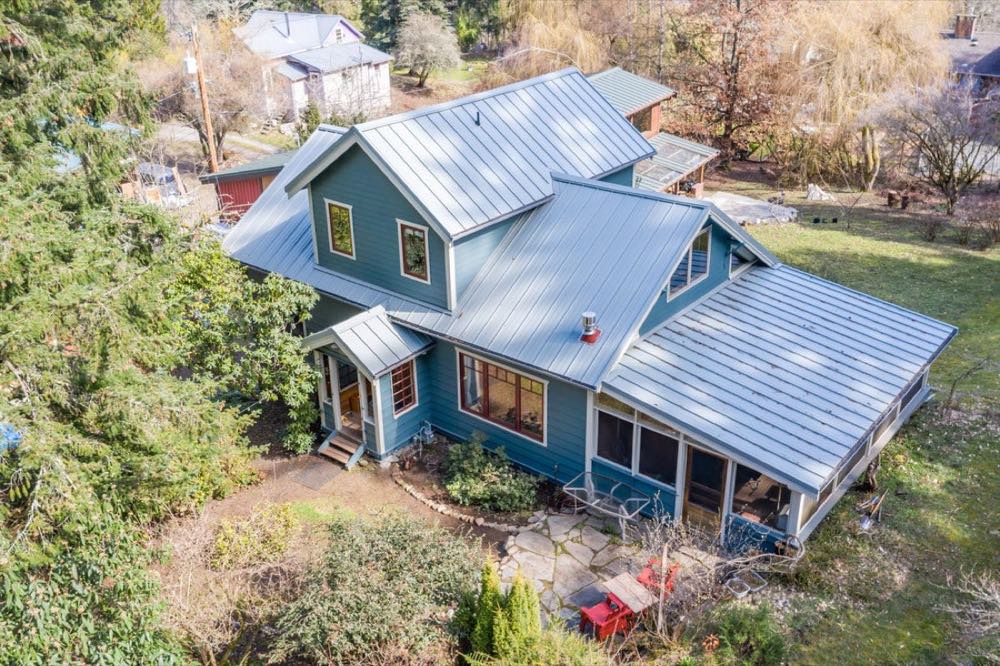 Columbia Bungalow Addition — cross-gable with metal roof